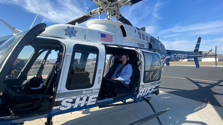 SDSU Student on San Diego Sheriff Helicopter tour during her internship